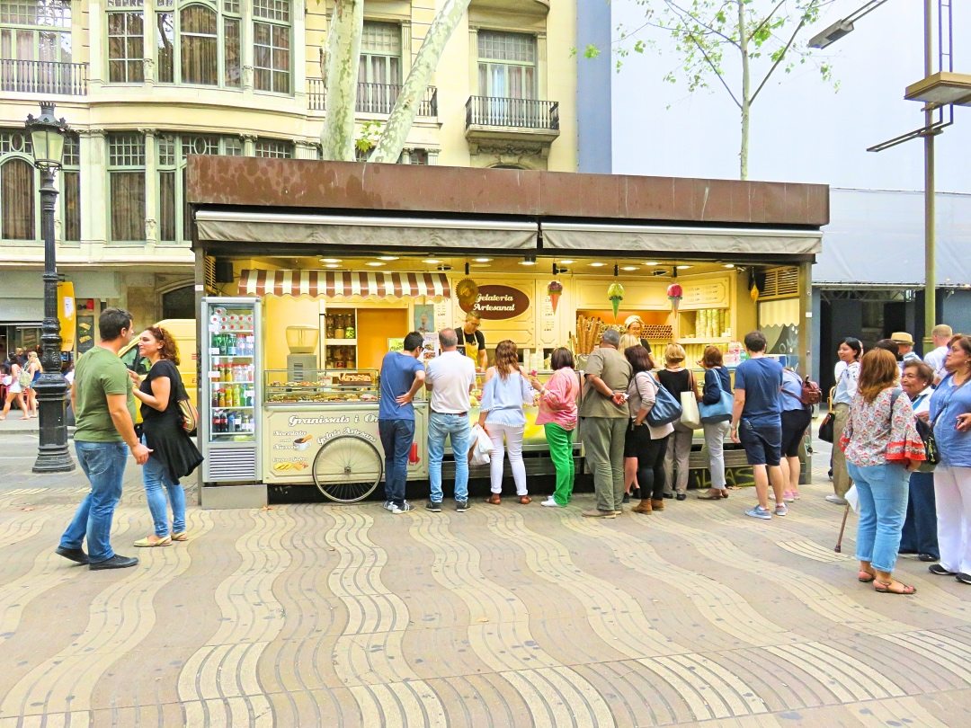 Tourists waiting in line at an ice cream truck at La Rambla Barcelona