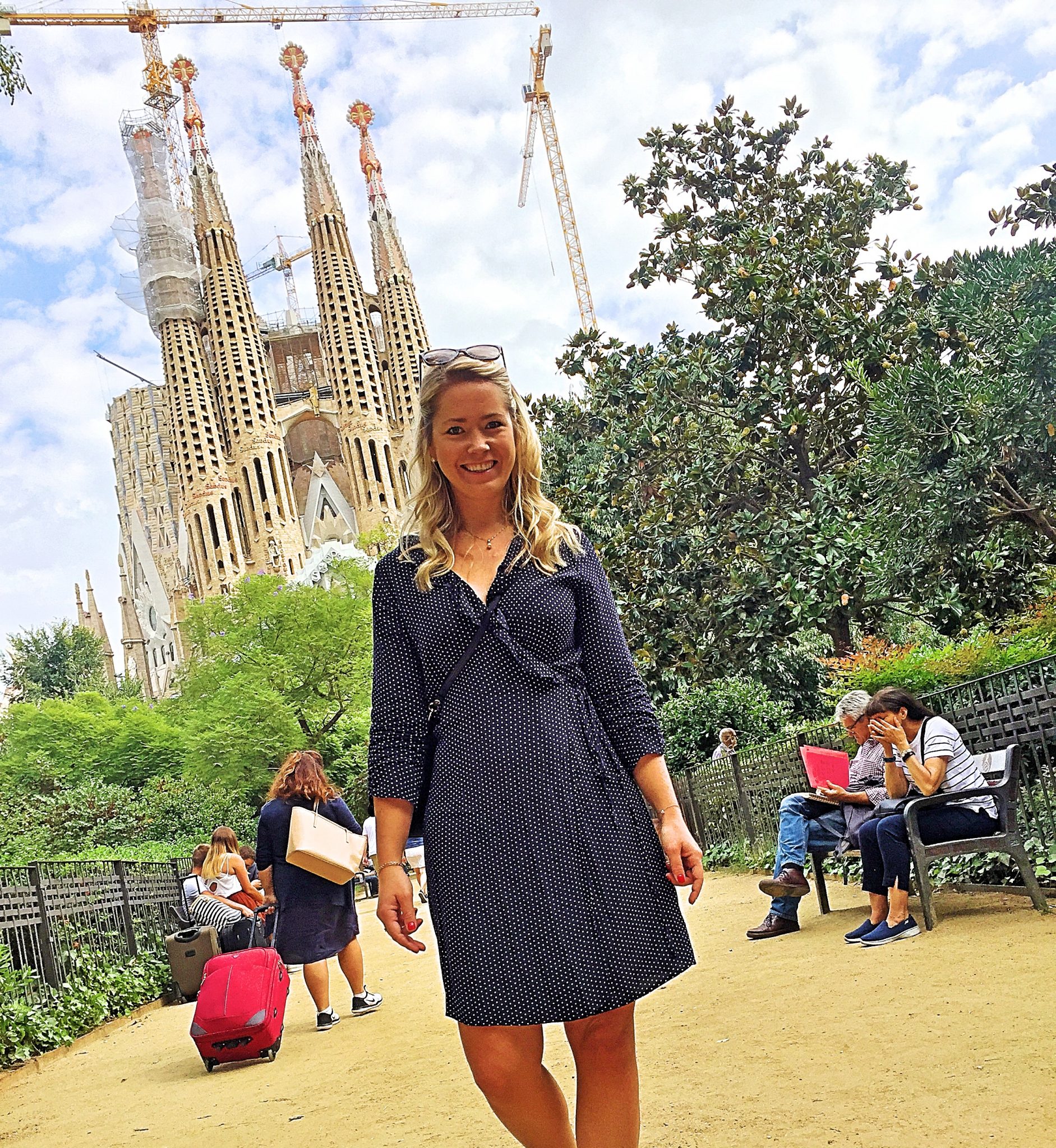 Picture of me with La Sagrada Familia in the back