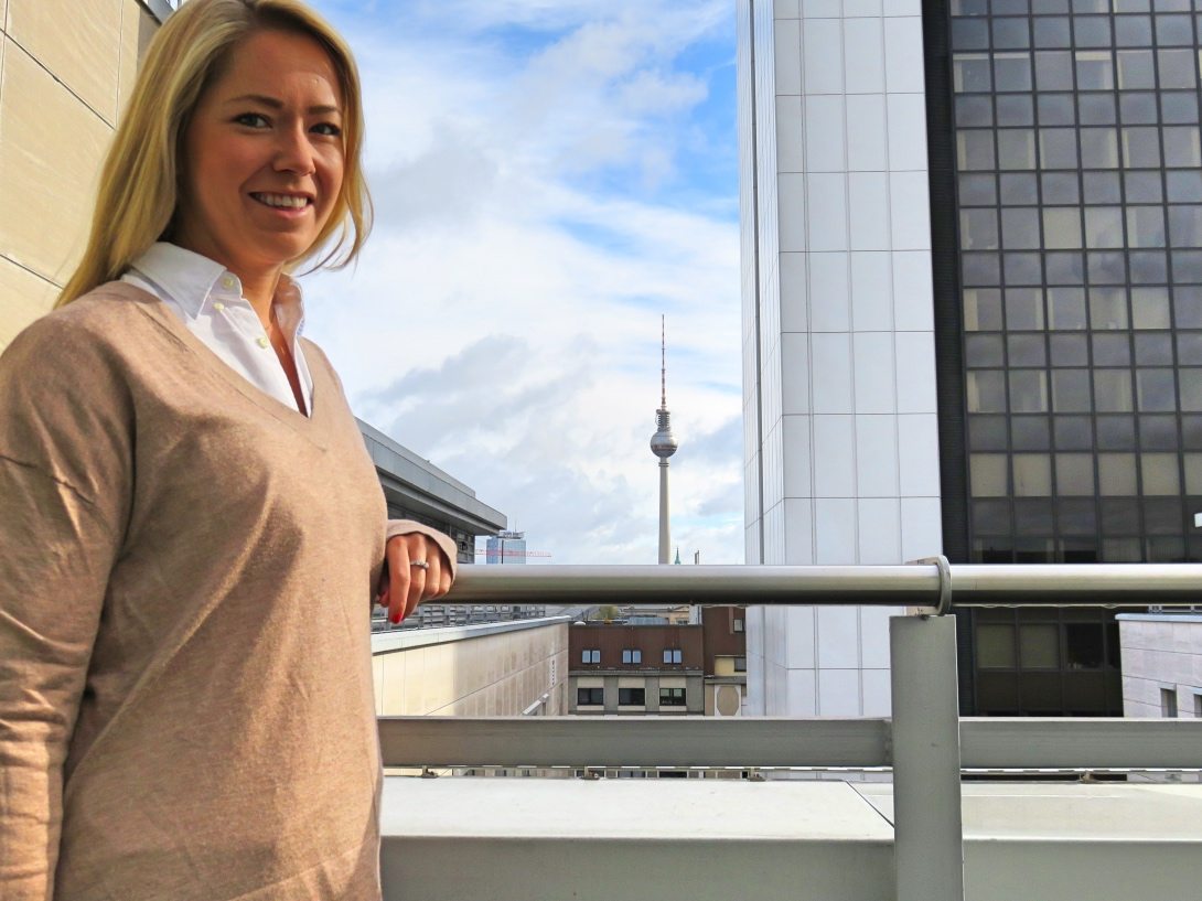 A picture of me in the balcony of the hotel with the TV tower in the background