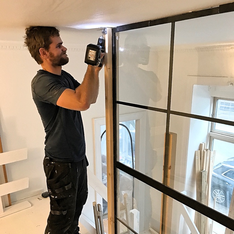 Installing-glass-wall