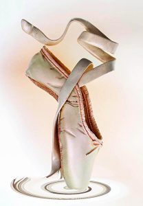 a ballet slipper with ribbons
