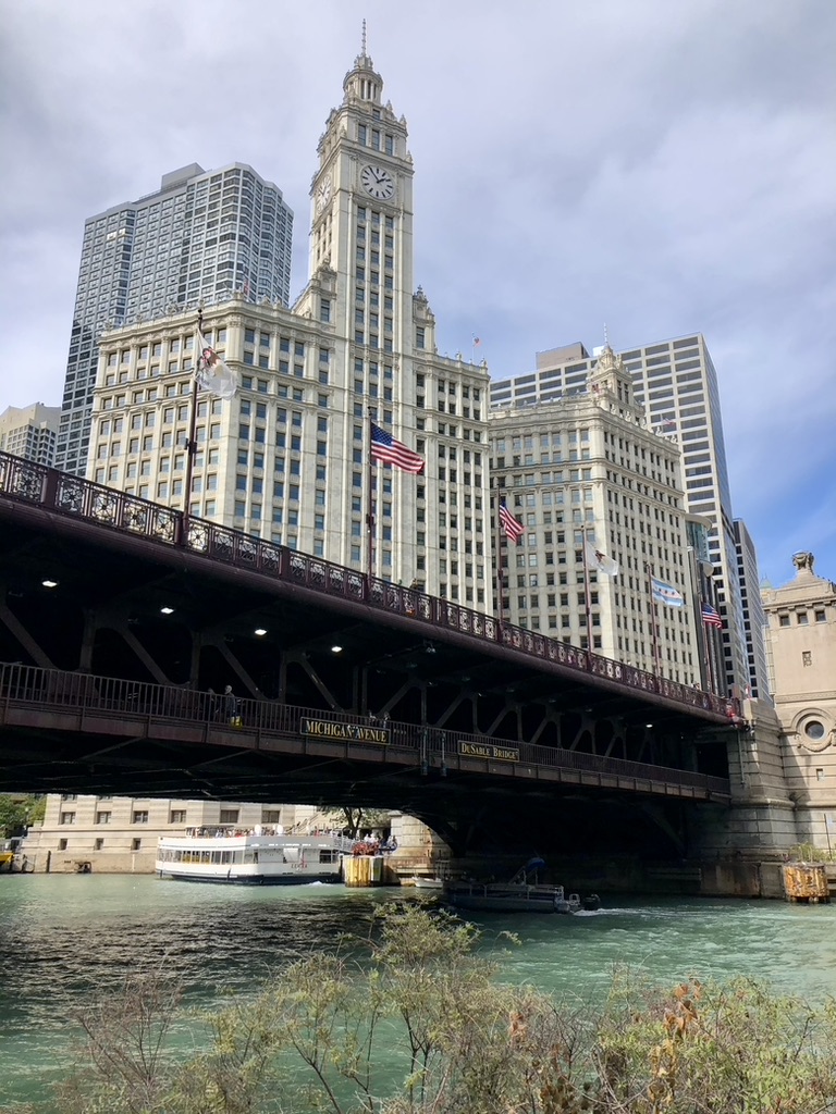Ultimate day in iconic downtown Chicago. Iconic buildings and bridgea at the Chicago Riverwalk
