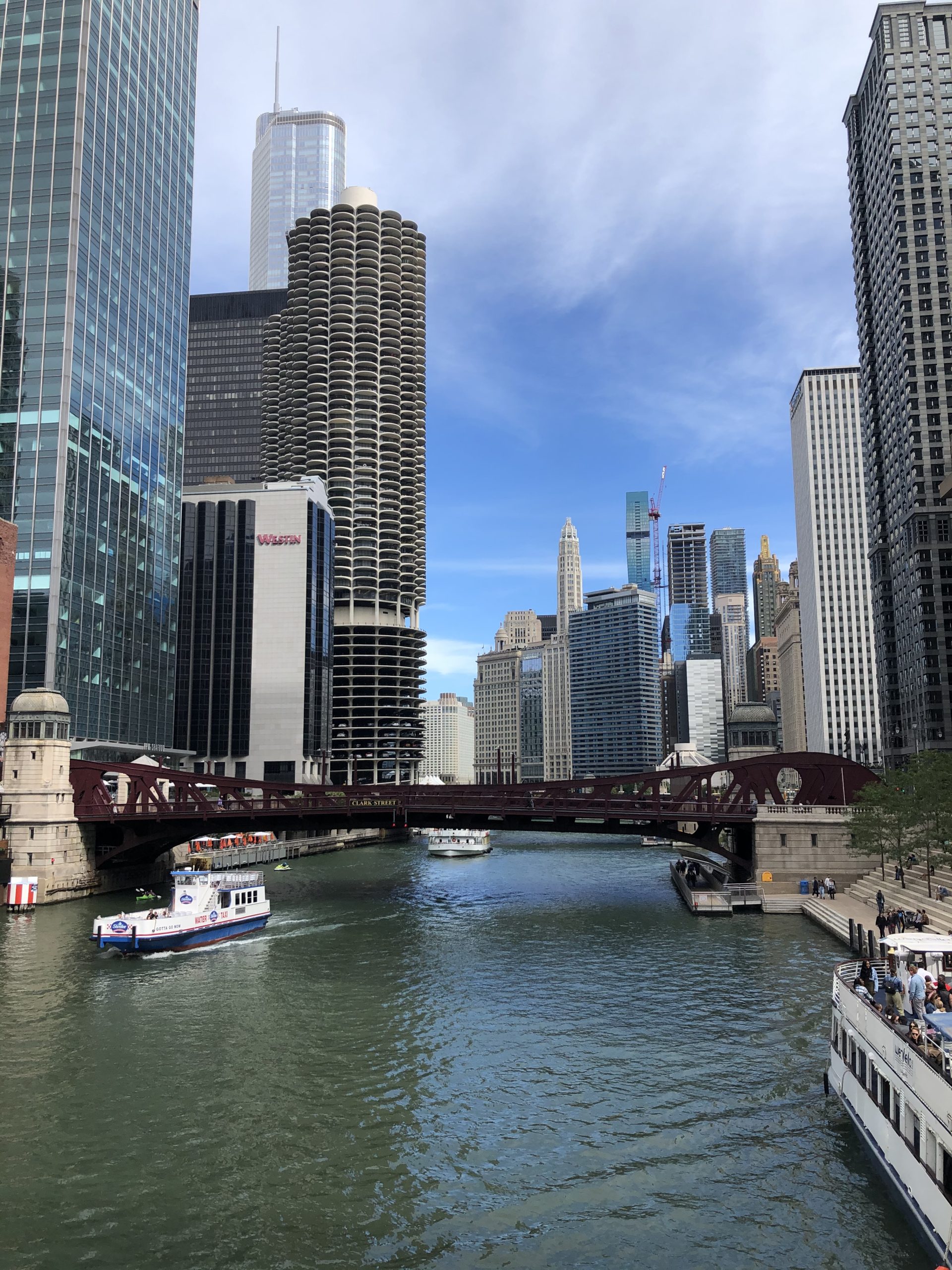 Ultimate day in iconic downtown Chicago. Iconic buildings and bridgea at the Chicago Riverwalk
