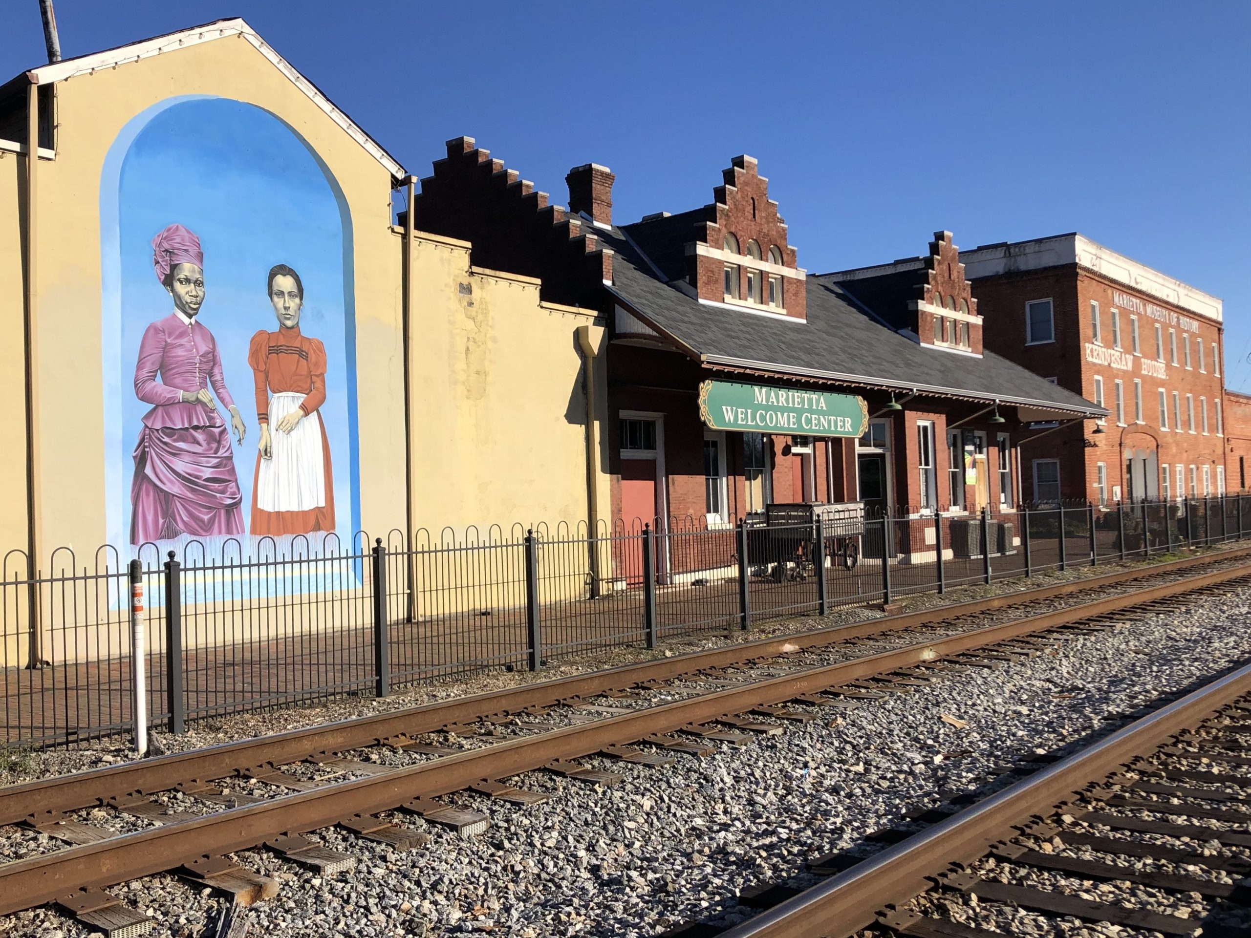 Mural of two women in Marietta
