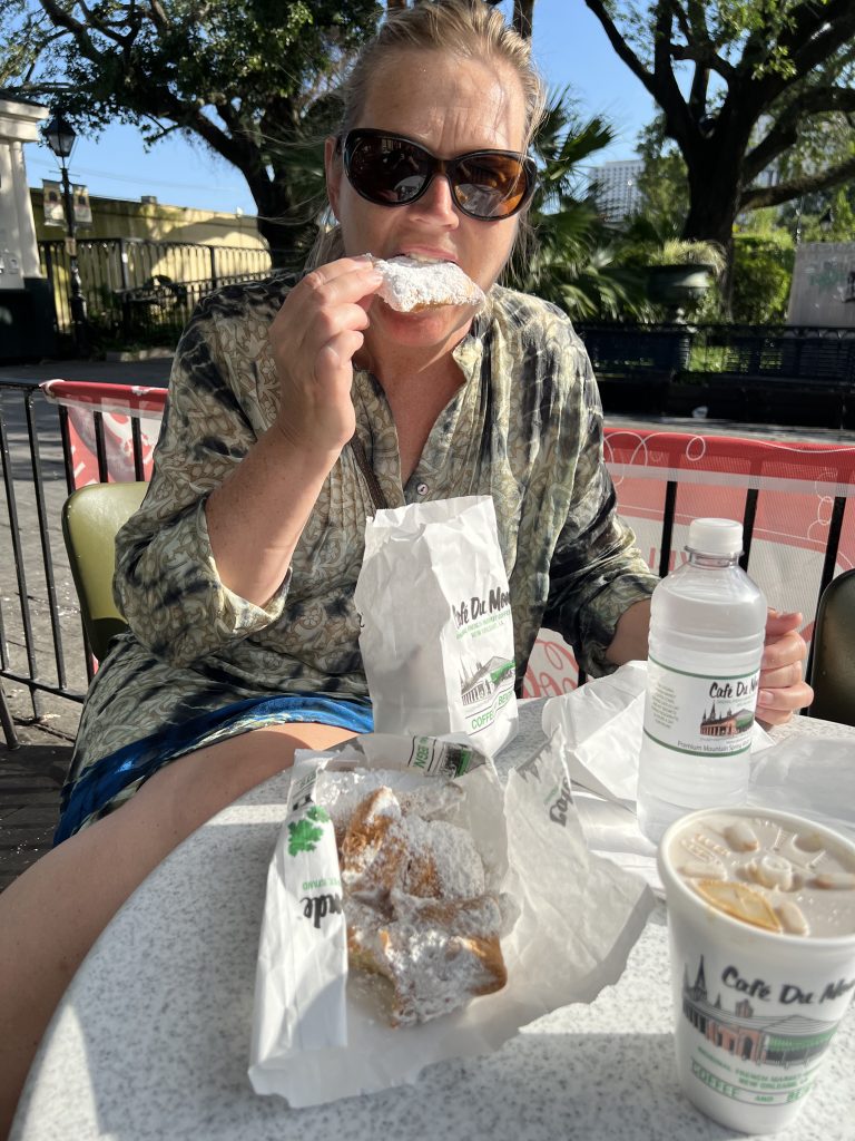 Discover the heart and soul of New Orleans eating fresh Beignets at Cafe Du Monde