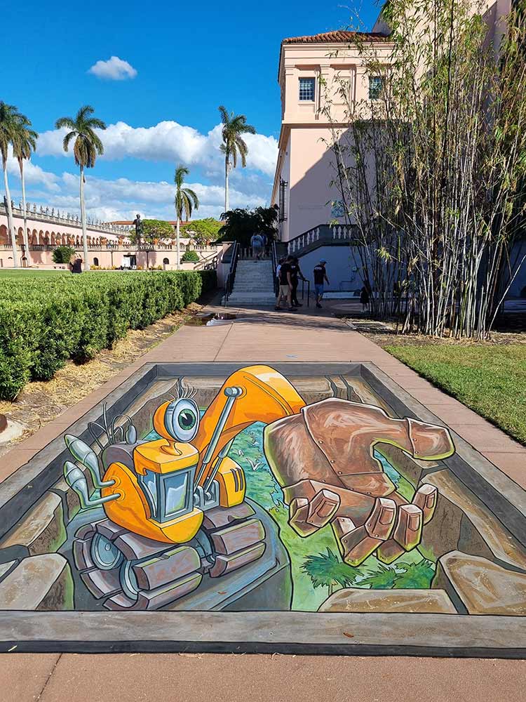 3D Streetpainting ‘3D Excavator’ Sarasota Chalk Festival at Ringling Museum, Sarasota, Florida, USA