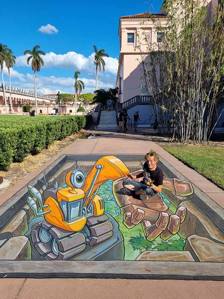 3D Streetpainting ‘3D Excavator’ Sarasota Chalk Festival at Ringling Museum, Sarasota, Florida, USA