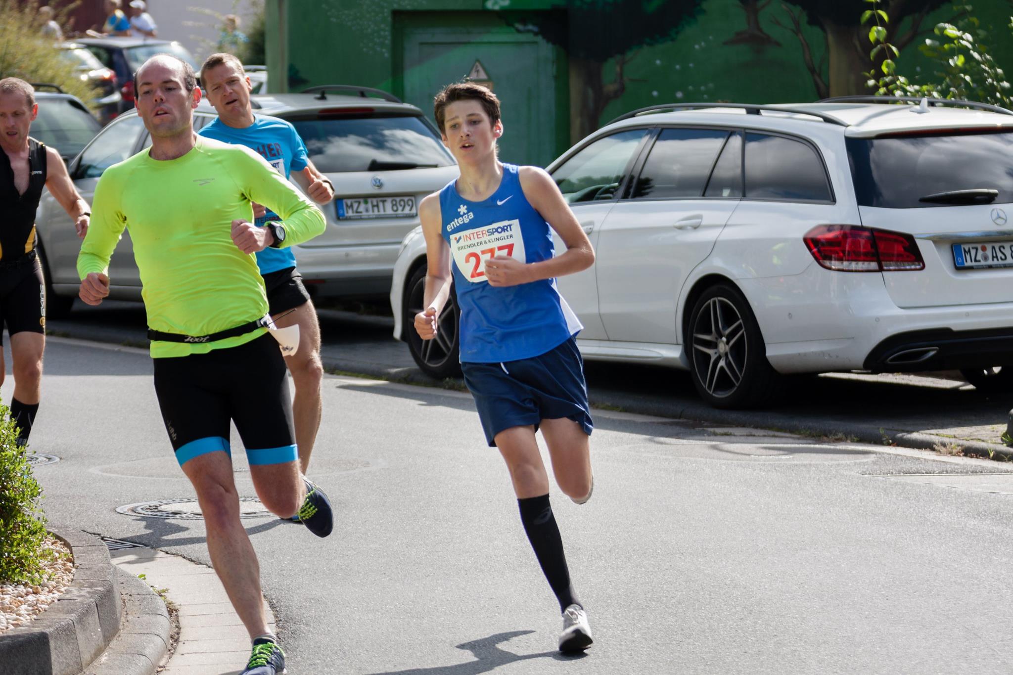 Kid running the 5k, pretty impressive