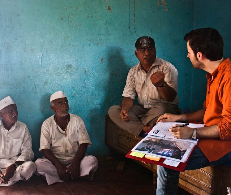 Photo of an interview, taken place in rural India.