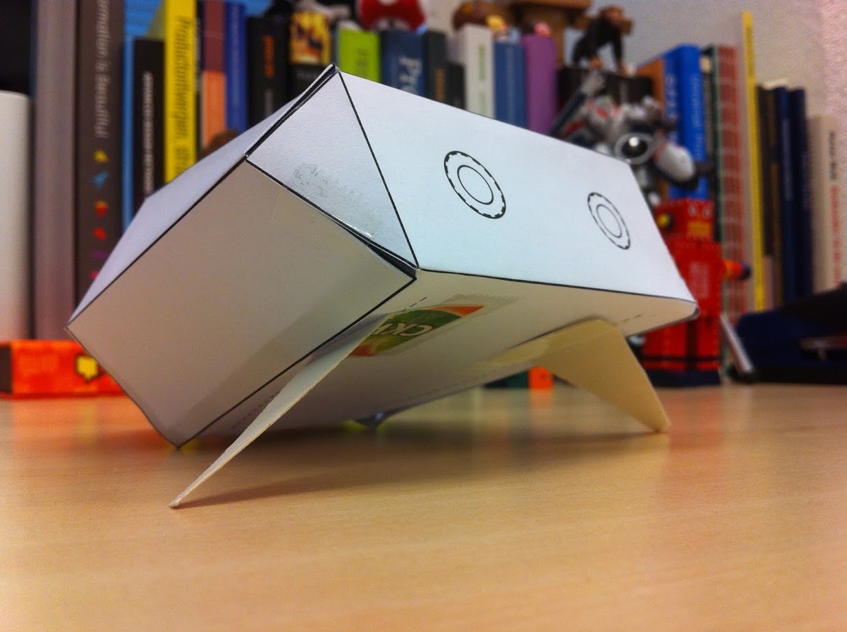 A paper prototype of Polygon on a desk