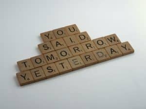 NLP for procrastination scrabble tiles saying you said yesterday today