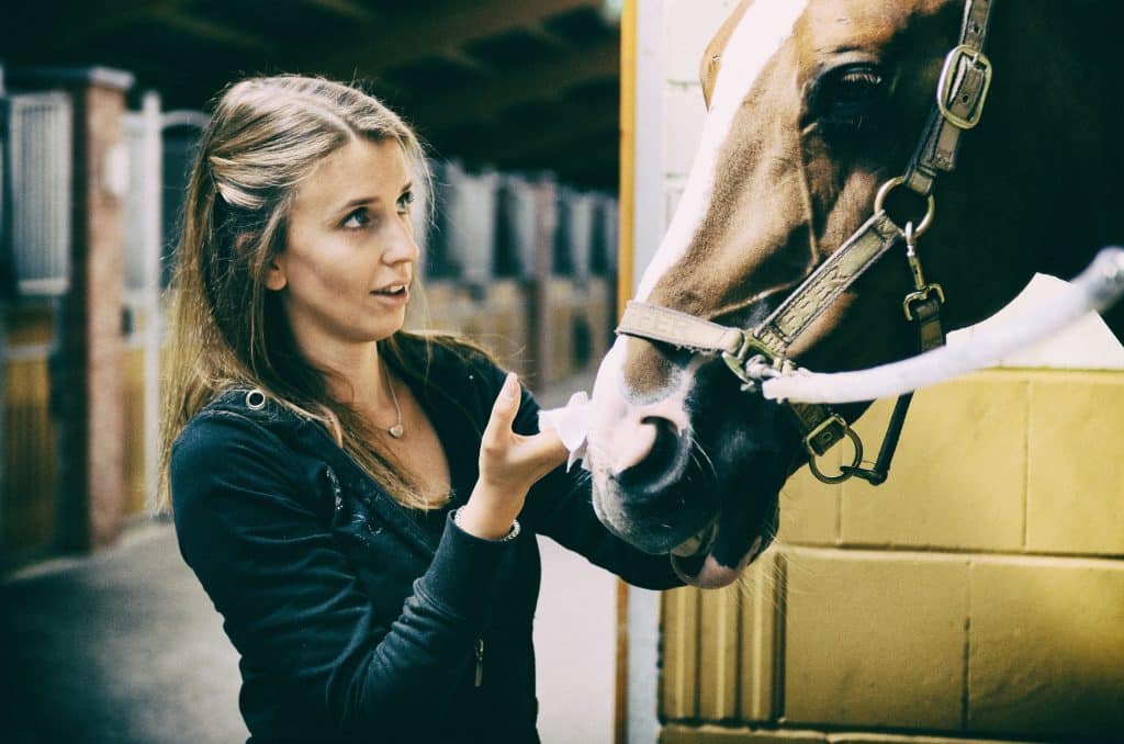 Woman trying to get back on the horse