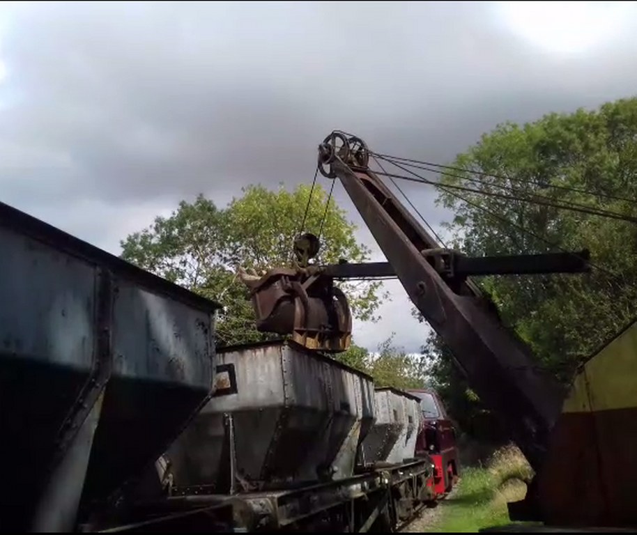 Ruston Bucyrus RB22 face shovel demonstrating iron ore loading into wagons.