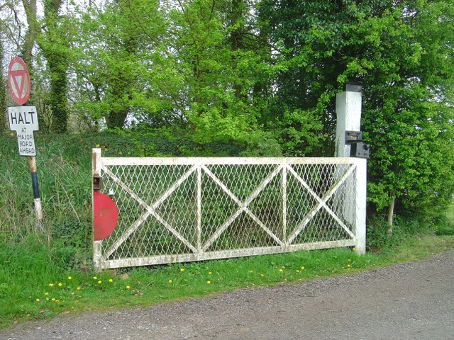 Our main entrace gate is an old metal level crossing gate.