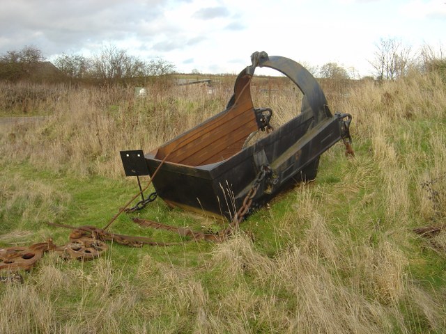 An old dragline excavotor bucket capable of holding many tons of iron ore.