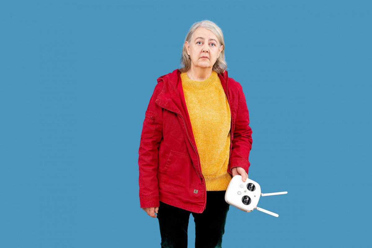 Sad woman in studio. Crashed a drone.