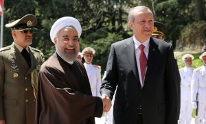 Iran’s president, Hassan Rouhani, greets his Turkish counterpart, Recep Tayyip Erdoğan