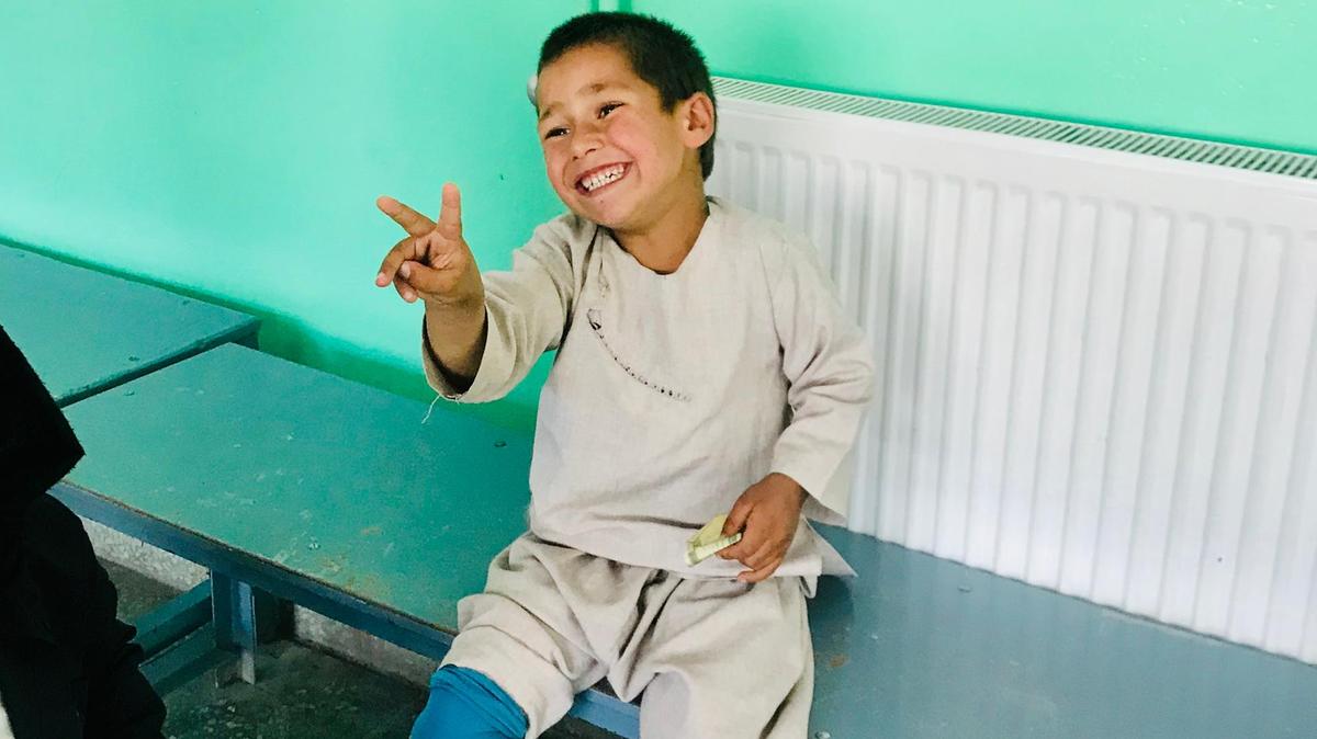 Afghan boy dances for joy with new prosthetic leg