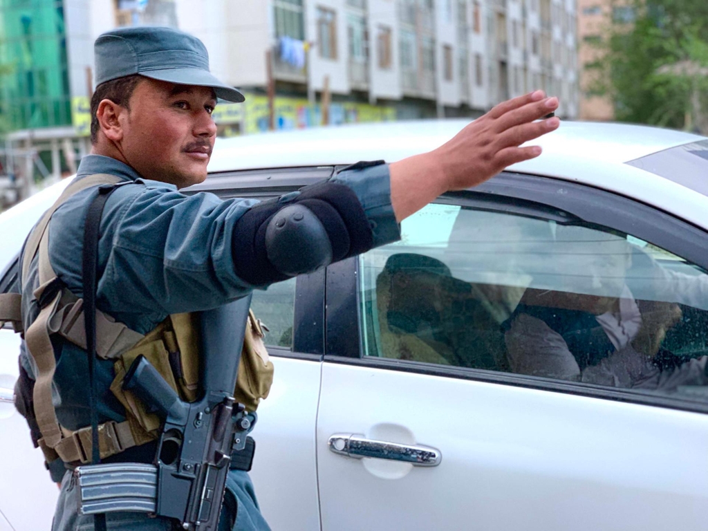 For Afghan police, breaking fast on the job carries risk