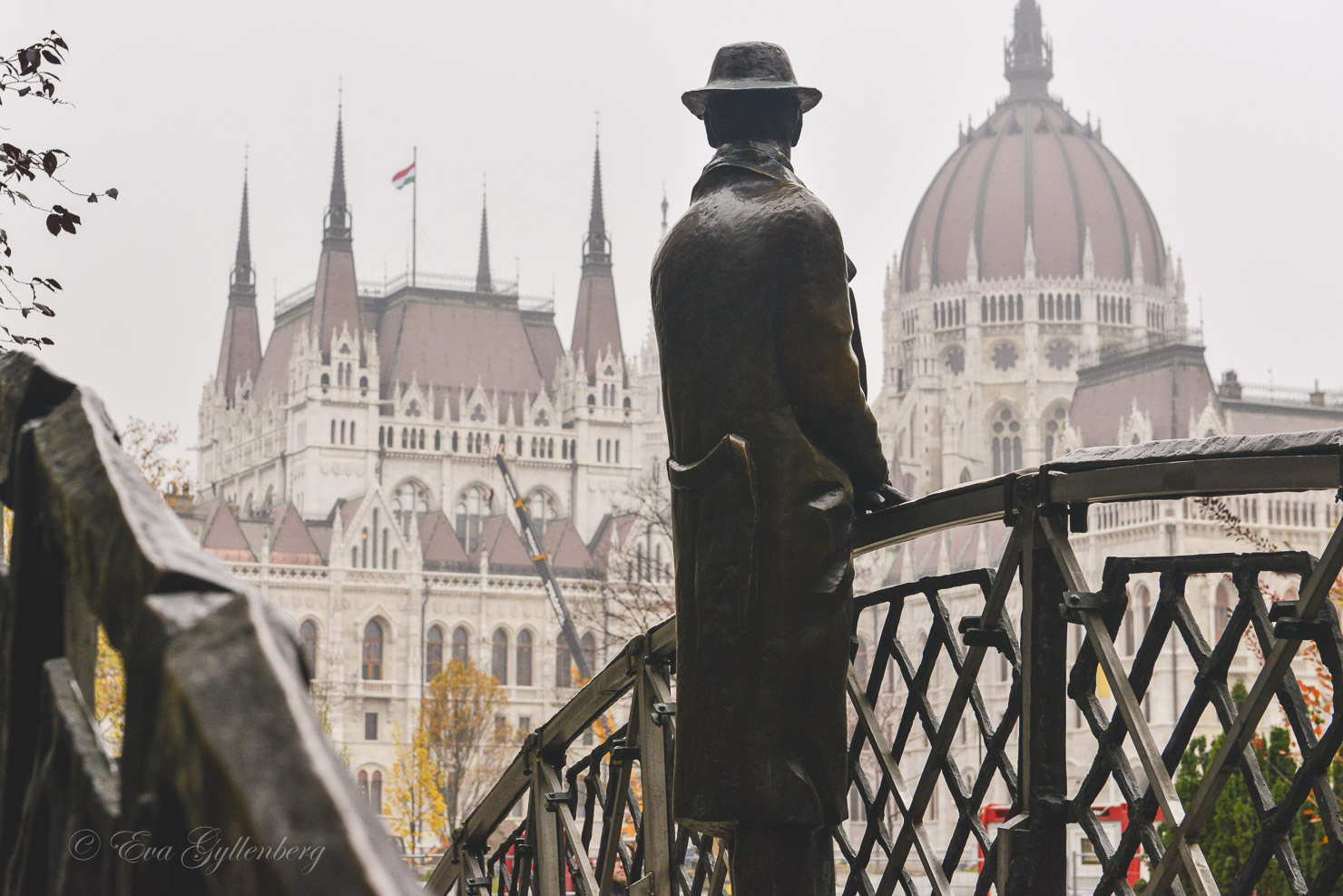 Parliament with a statue looking on