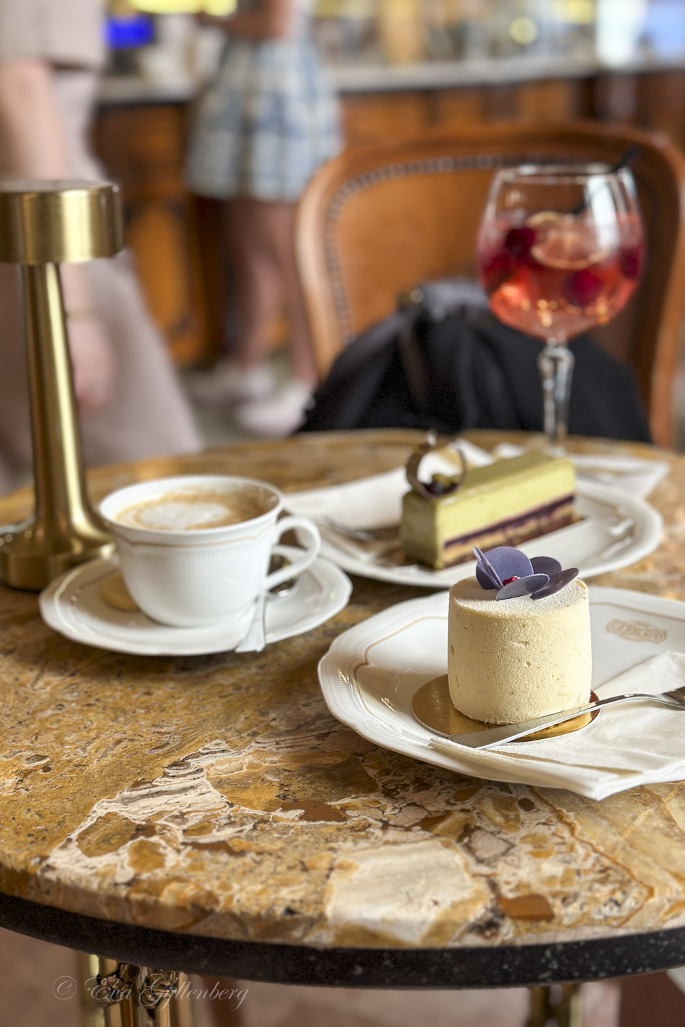 Table with cakes and coffee at Café Gerbeaud