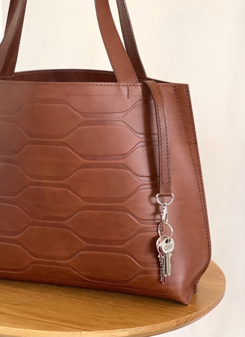 Gallery chestnut debossed tote with keychain detail