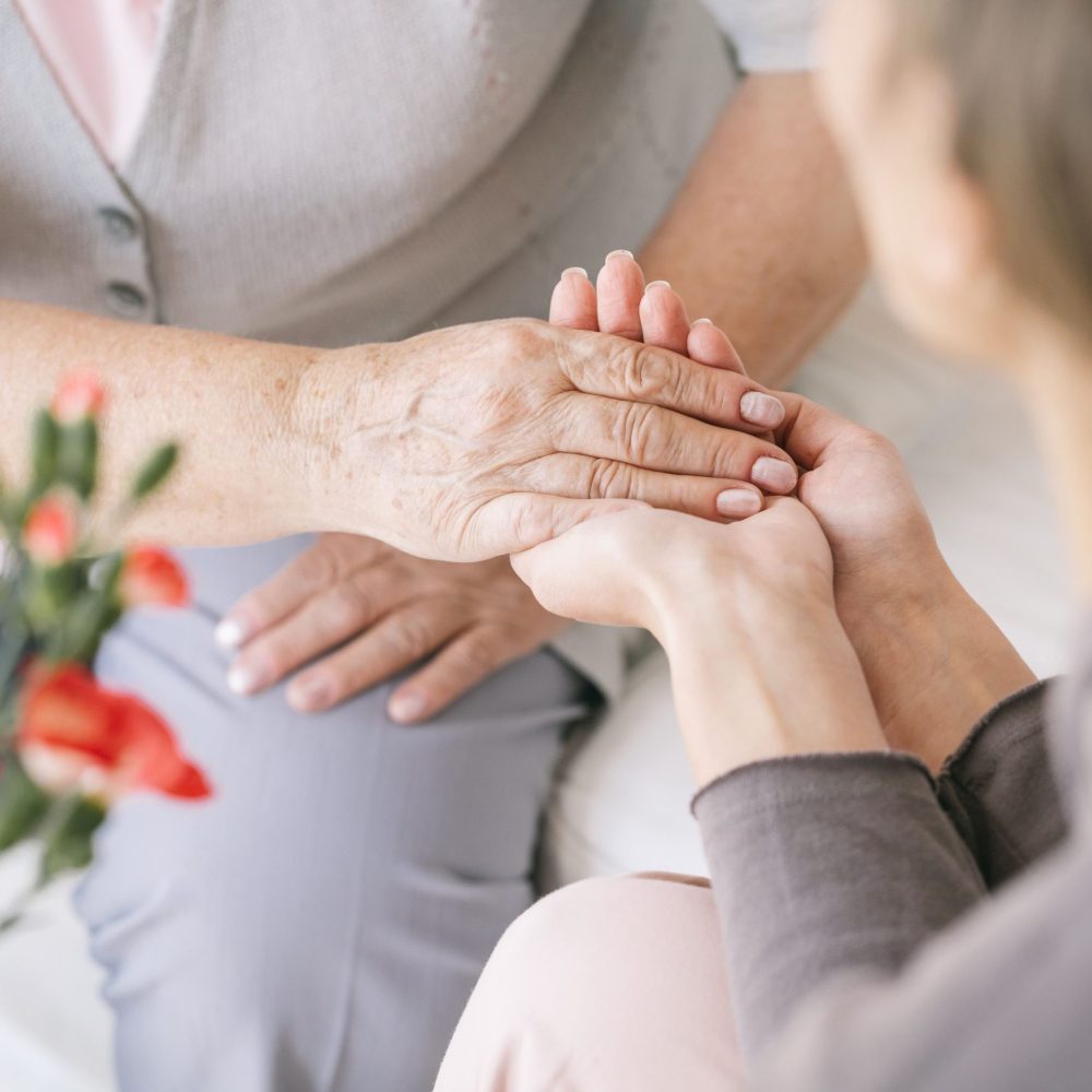 caretaker-giving-her-hand-2021-08-26-15-45-47-utc-min caretaker-giving-her-hand-2021-08-26-15-45-47-utc-min