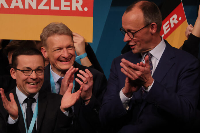Roland Theis, Stephan Toscani und Friedrich Merz am 6. Februar in St. Ingbert