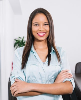 smiling-african-american-young-lady-near-window (1)