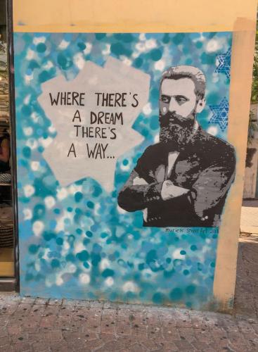 Streetart in Tel Aviv: eine Interpretation von Theodor Herzls bekanntem Zitat