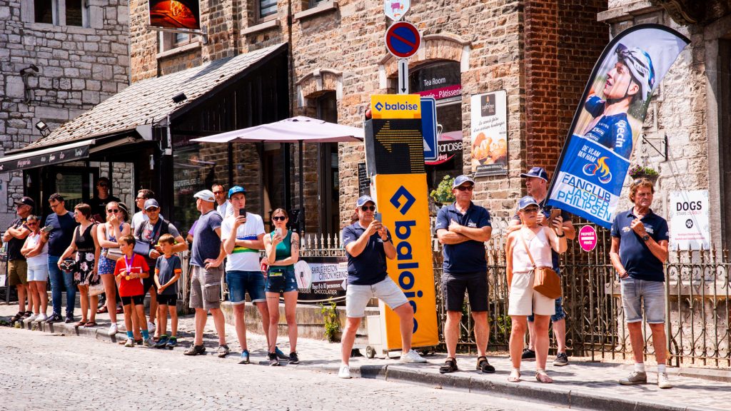 Baloise Belgium Tour 2023 using Safe Cycling Safety Sign (Mobile LED-sign for sporting events) with commercial space for event sponsors.