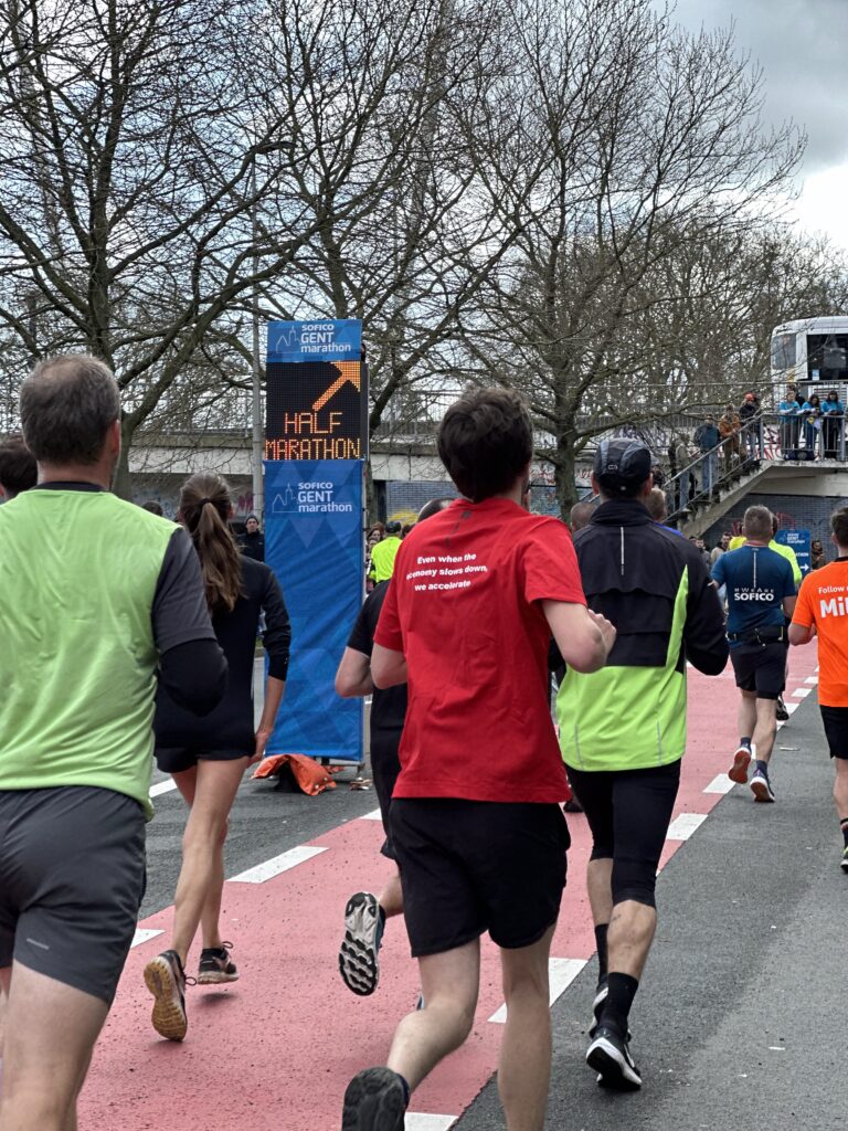 Sofico Gent Marathon 2024 using Safe Cycling Safety Sign (Mobile LED-sign for sporting events) with commercial space for event sponsors.