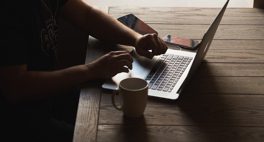 Person working at laptop