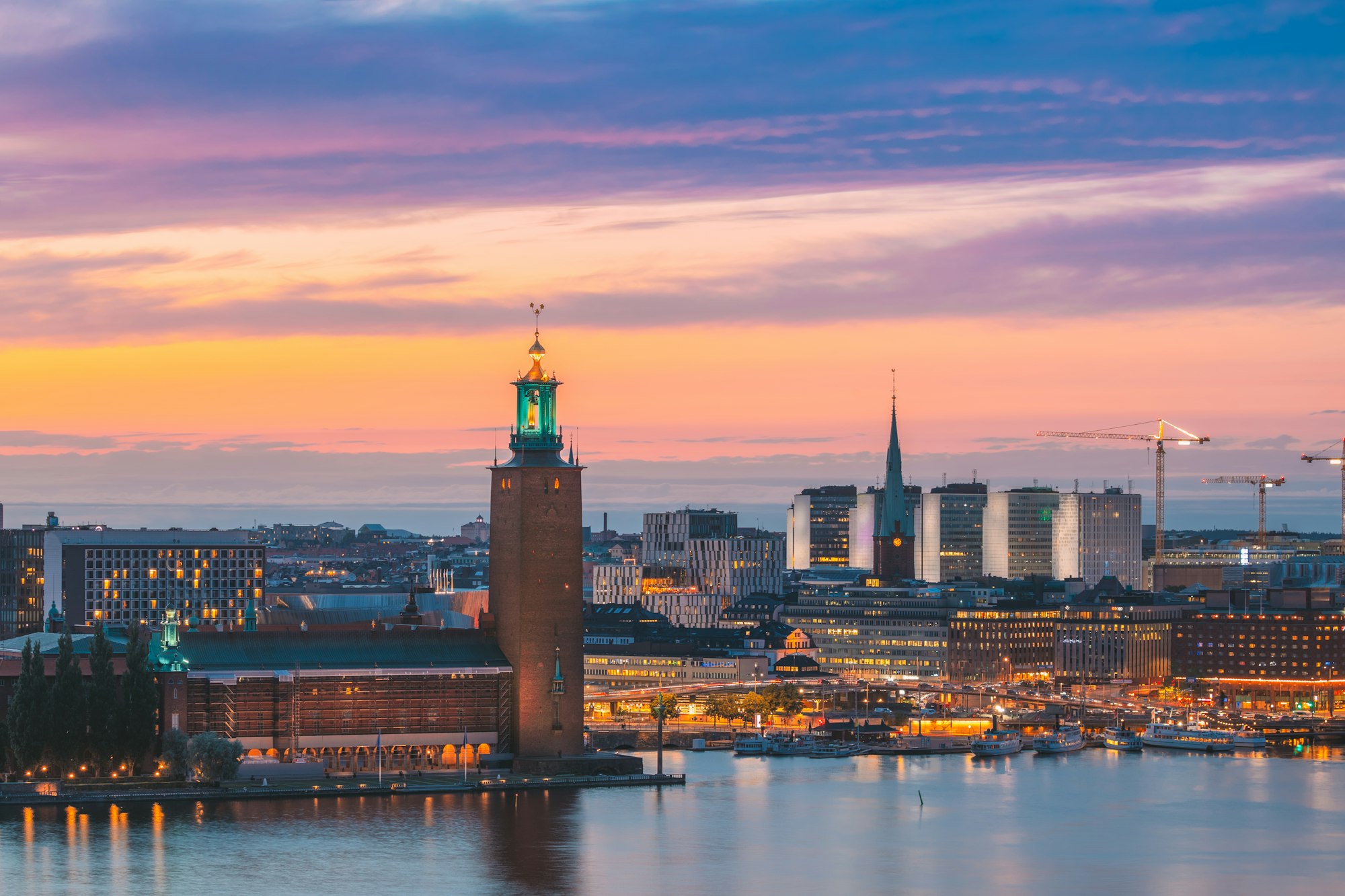 Stockholm, Sweden. Scenic Skyline View Of Famous Tower Of Stockholm City Hall And St. Clara Or Saint