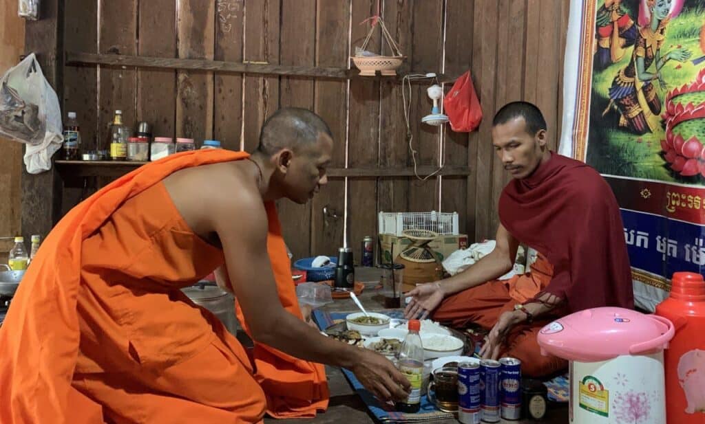 Sam Offers Food to Monk