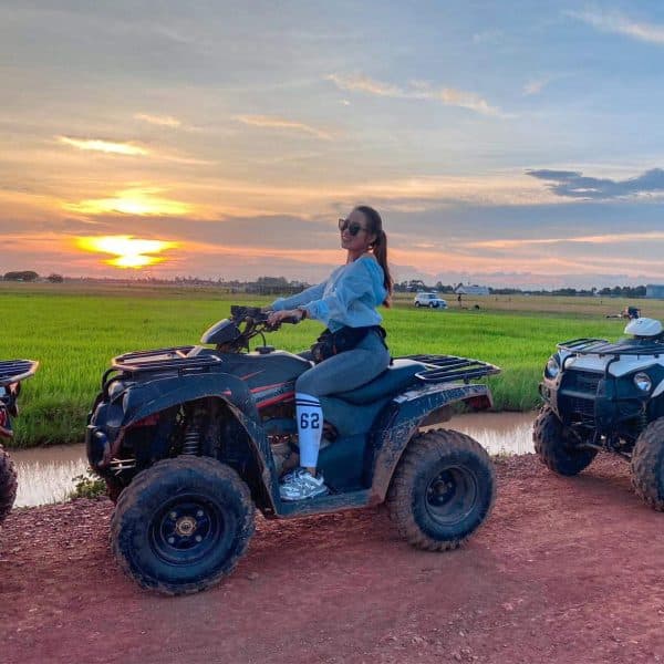 Quad Rise to Watch Sunset on Countryside