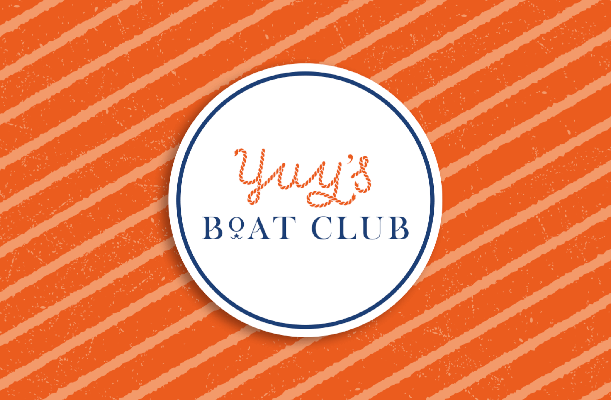 Yuy's Boat Club Logo in a circle on an orange striped background