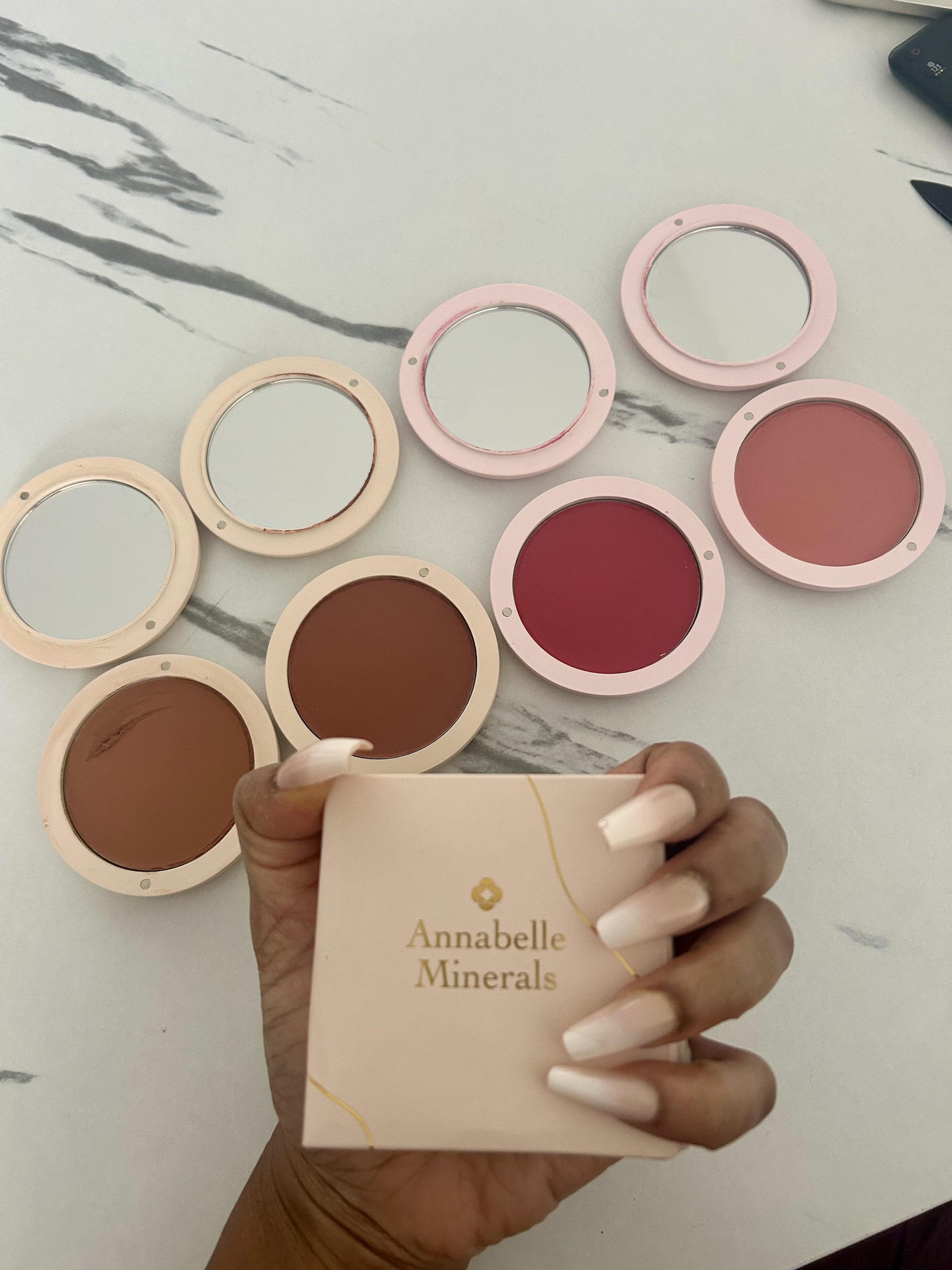 Holding makeup by Annabelle Minerals