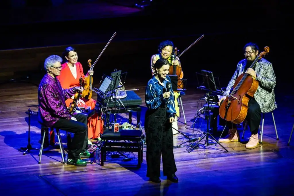 “Saskia Venegas Aernouts with Kronos Quartet at the premiere of her piece Through Their Eyes, music theatre maker and composer, also known as Saskia Venegas.”