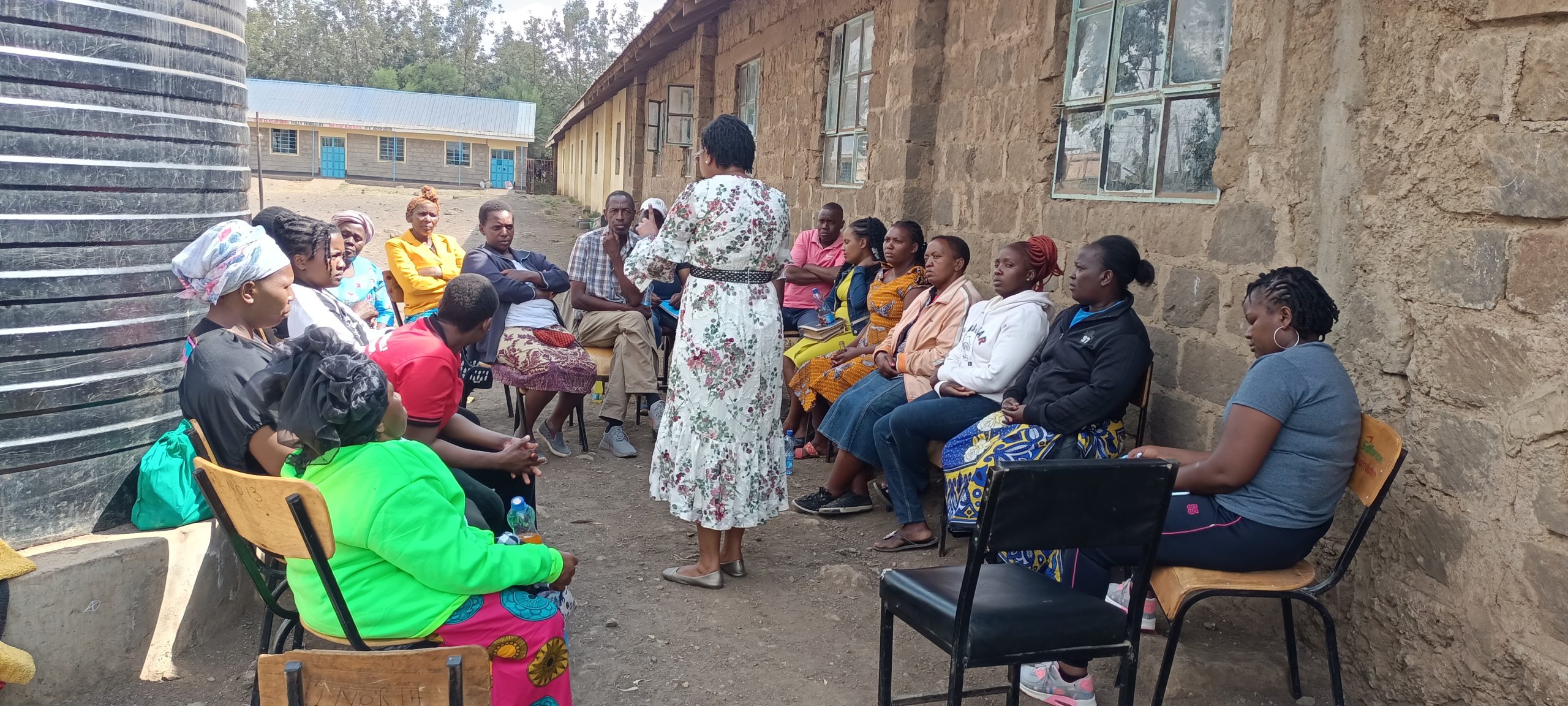 A group therapy session on social stigma being conducted by Immaculate Gitonga, a Counselling Psychologist