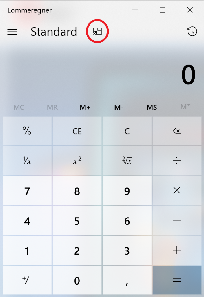 Klik på det lille symbol i den røde cirkel for at få lommeregner-appen til at blive oven på vinduet.