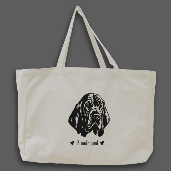 Foto av naturvit tygväska med svart illustration av hundhuvud av rasen Bloodhound