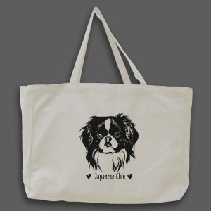 Foto av naturvit tygväska med svart illustration av hundhuvud av rasen Japanese Chin