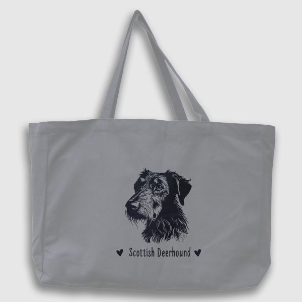Foto av grå tygväska med svart illustration av hundhuvud av rasen Scottish Deerhound