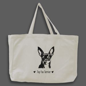 Foto av naturvit tygväska med svart illustration av hundhuvud av rasen Toy Fox Terrier