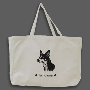 Foto av naturvit tygväska med svart illustration av hundhuvud av rasen Toy Fox Terrier