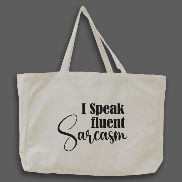 Naturvit tygväska med svart text på engelska: "I Speak fluent sarcasm"