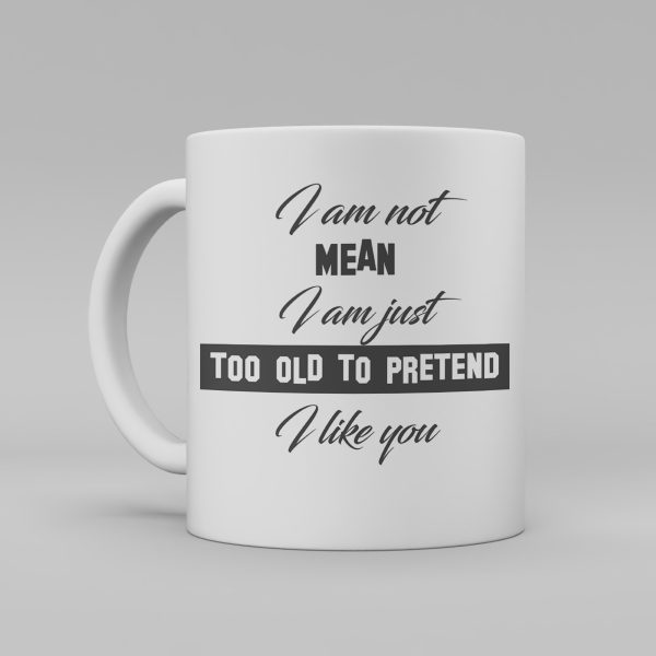 Vit keramikmugg med svart text på engelska: "I am not mean I am just too old to pretend I like you"
