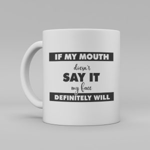 Vit keramikmugg med svart text på engelska: "If my mouth doesn't say it my face definitely will"