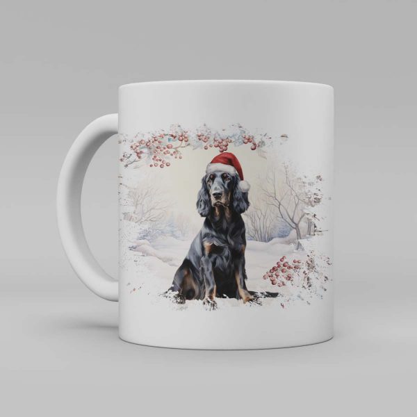 Foto av en vit keramikmugg med illustration av en hund med en tomteluva. Hunden är av rasen Gordon Setter